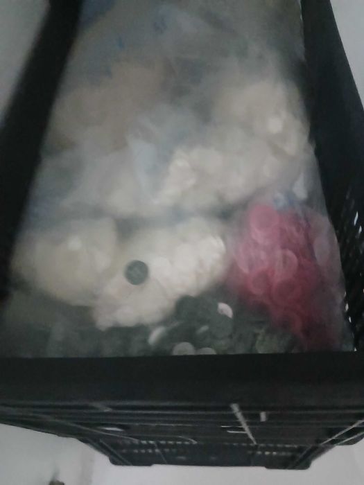 Sacos de botões novos