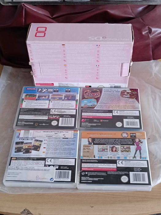 Nintendo DS Pink na caixa e 4 jogos