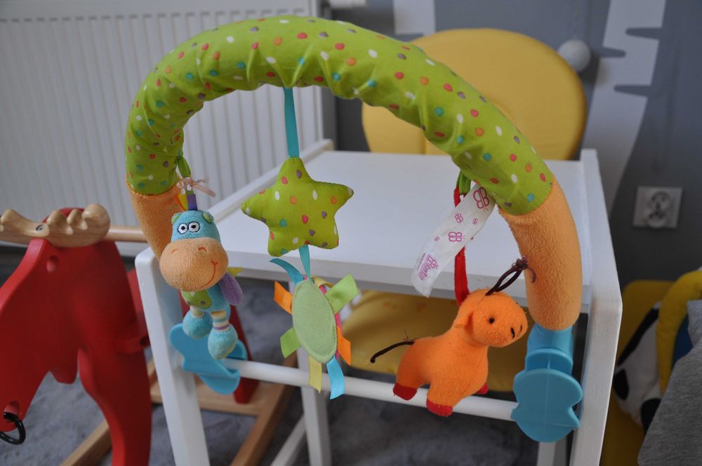 Pałąk do wózka kołyski łóżeczka fotelika samochodu zabawki żywe kolory