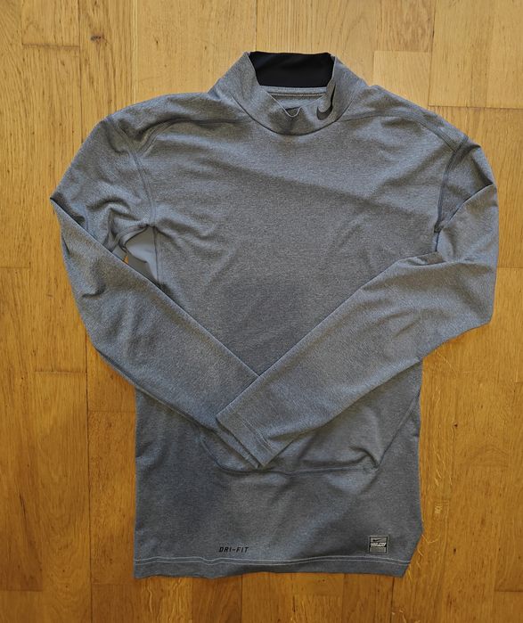 Świetna praktycznie nowa bluzka do biegania na trening Nike Pro Combat