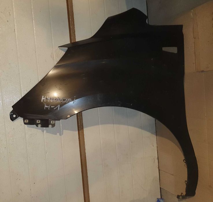 Hyundai H1 H-1 błotnik przód przedni lewy