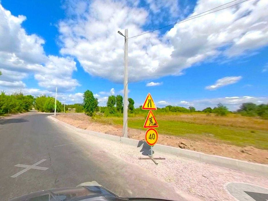 Продається Фасадна Земельна Ділянка під склад, промисловість біля Бучі, траси Київ-Ковель.