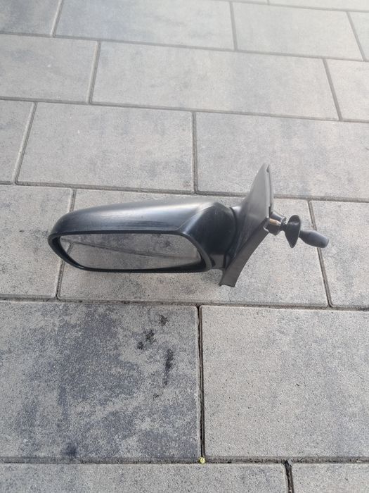Lusterko zewnętrzne manualne lewe kierowcy Toyota Yaris rok 2001