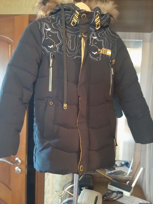 Продам зимню куртку на хлопчика