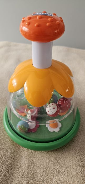 Chicco tęczowy bączek w kwiatki 6m+