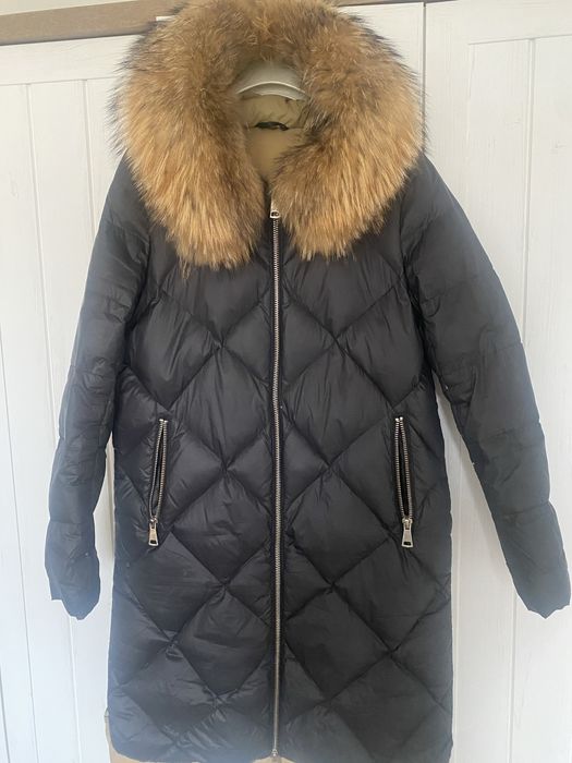 Sprzedam puchowy plaszcz,praktycznie nie uzywany.Ozdoba plaszcza piekn