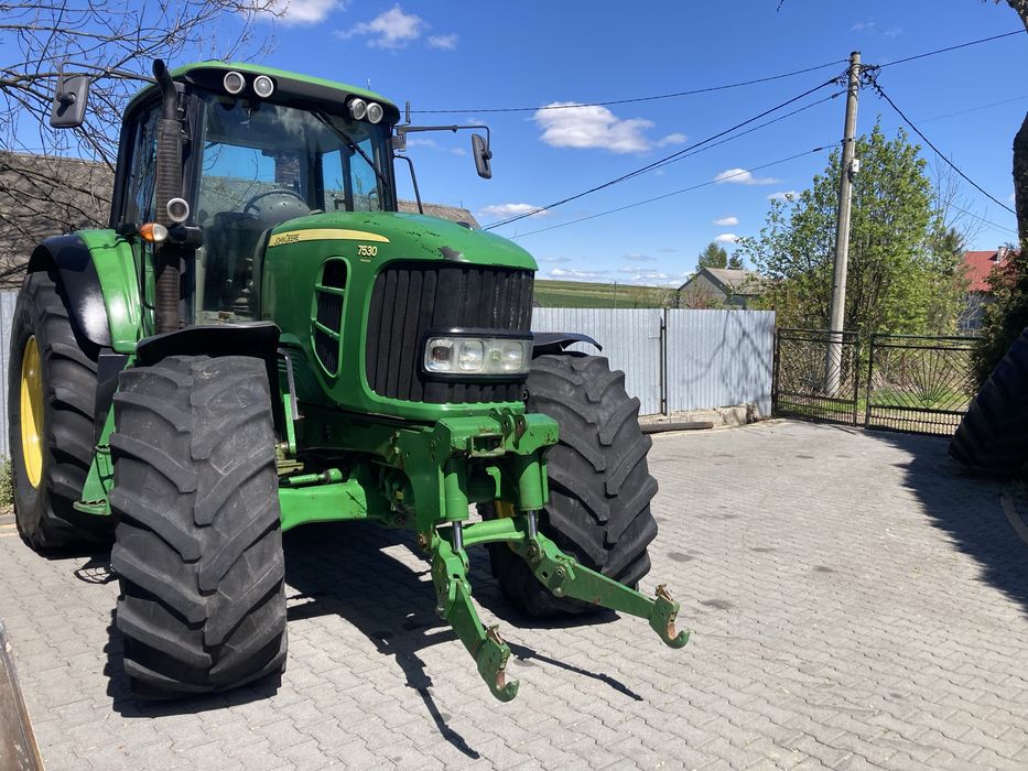 John  Deere. 7530 premium JD 7430