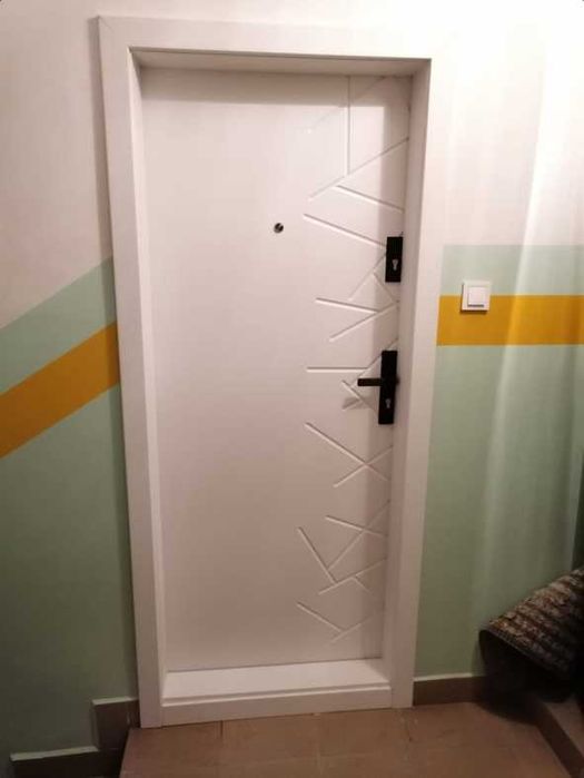 Drzwi wejściowe do mieszkania bez usuwania futryny - zabudowa