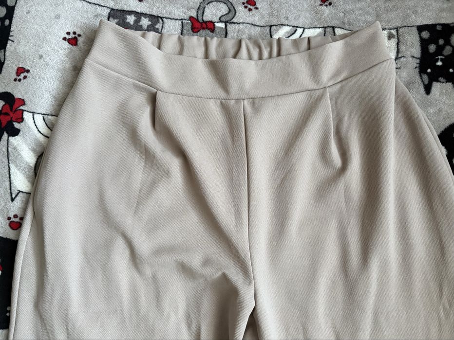 Nowe spodnie damskie beżowe L