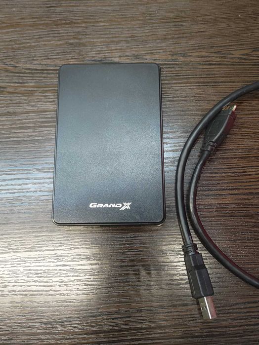 Внешний жесткий диск для хранения данных 750 ГБ.