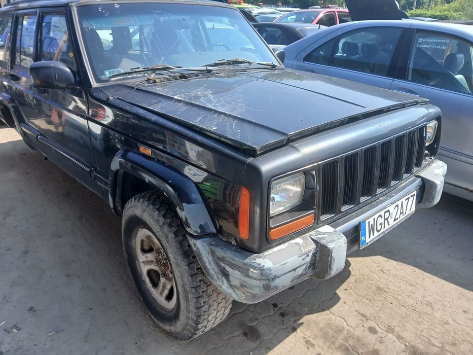 jeep grand cherokee zj maska zderzak lampa grill błotnik drzwi zbiornik paliwa szyba lusterko