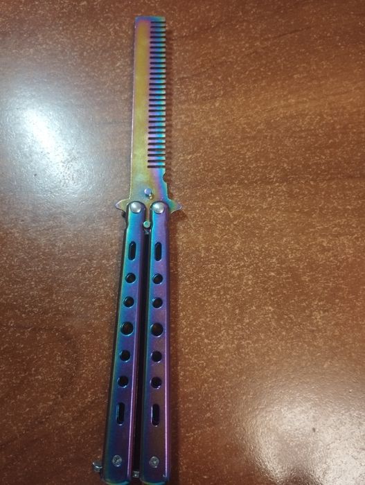 Ніж метелик (гребінець)