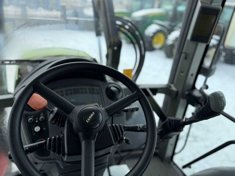 Трактор Ares 557 З фронтальним навантажувачем