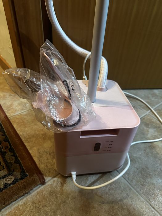 Ferro de engomar vertical