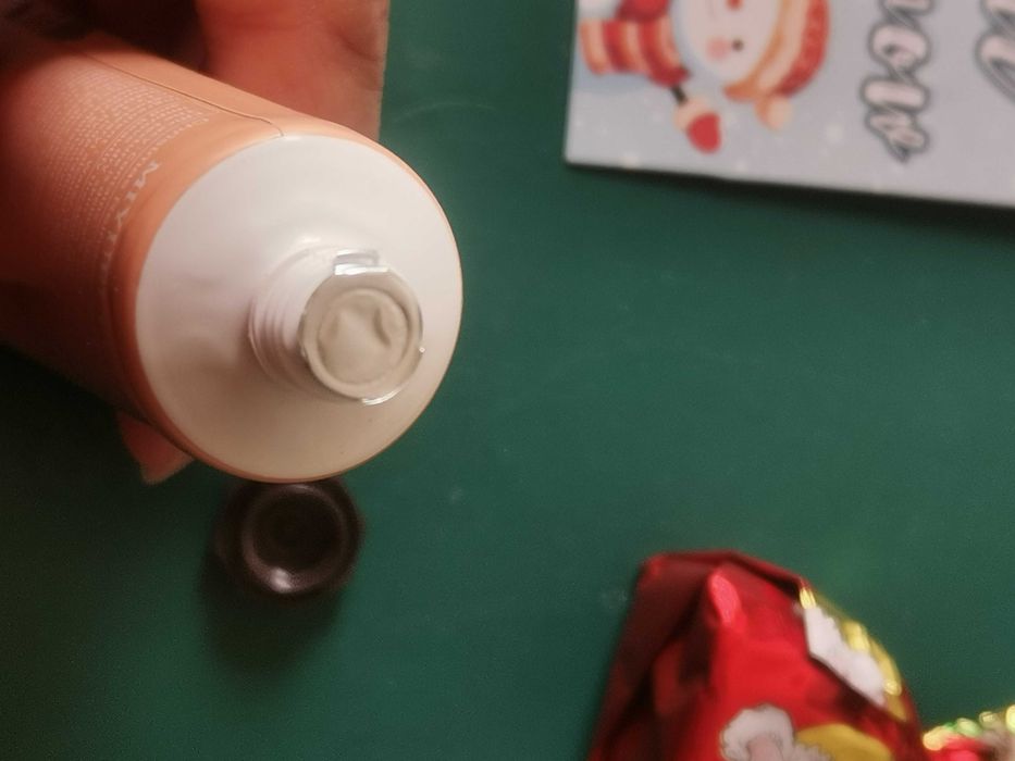 Creme de mãos, separador de livros
