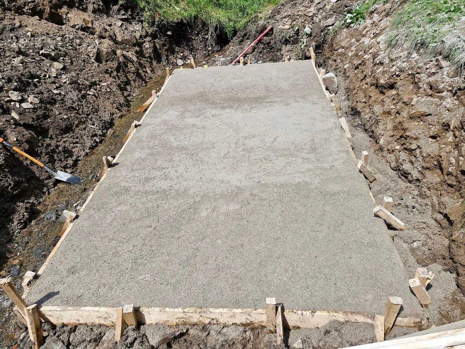 Roboty ziemne prace ziemne Drenaże Budowa dróg Niwelacje teren koparka