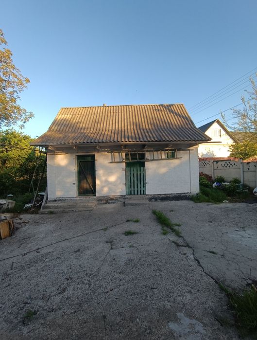 Продам цегляний будинок в селі Шкарівка