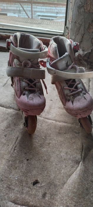 Коньки роликовые