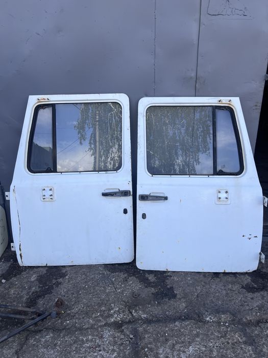 Двері замки стекла ручки Газ 3307-3309