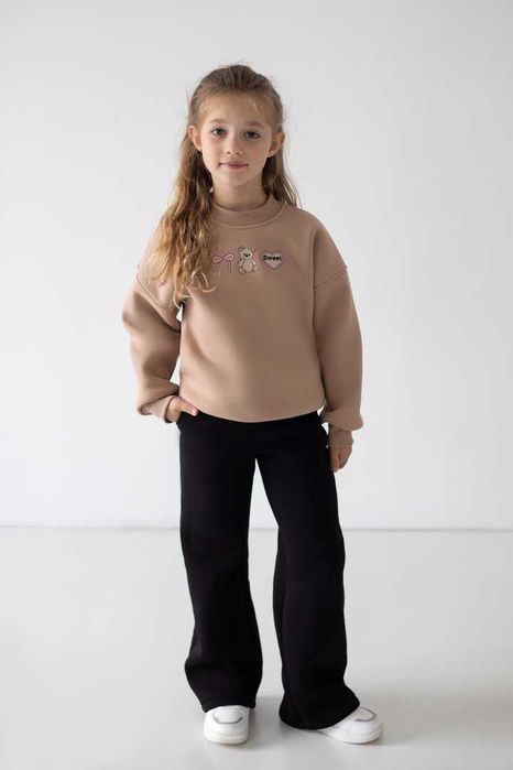 Теплі чорні штани розмір 134