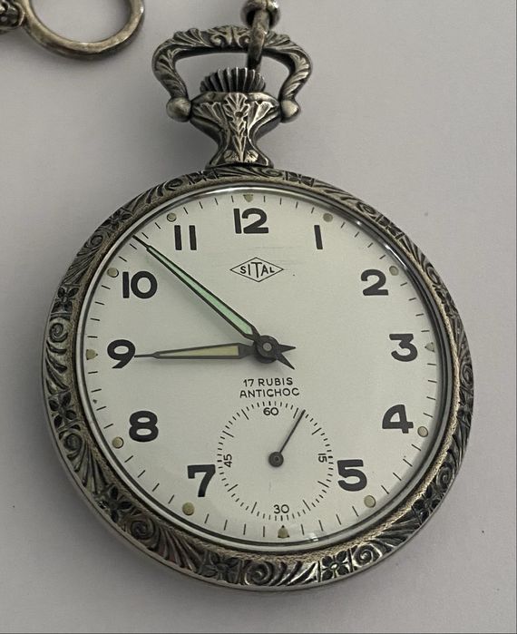 Relógio de bolso Sital, mecânico, com corrente.