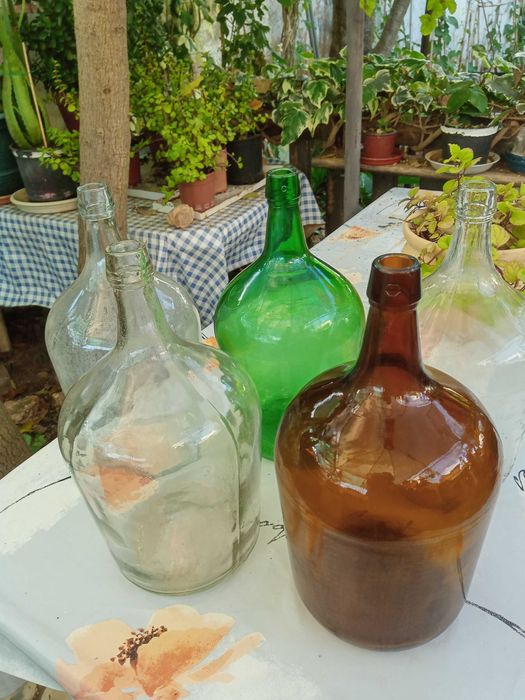 Garrafões vidro 5 litros.. Ver discrição