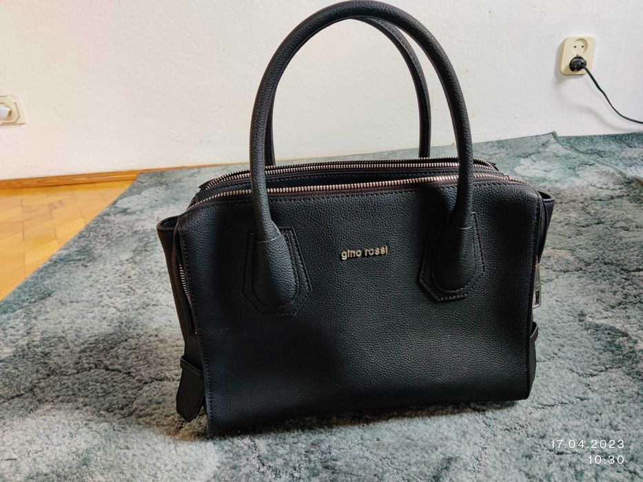 Klasyczna, skórzana torba na laptopa marki Gino Rossi