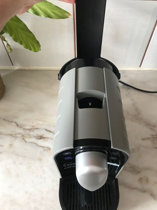 Máquina de café expresso e cápsulas