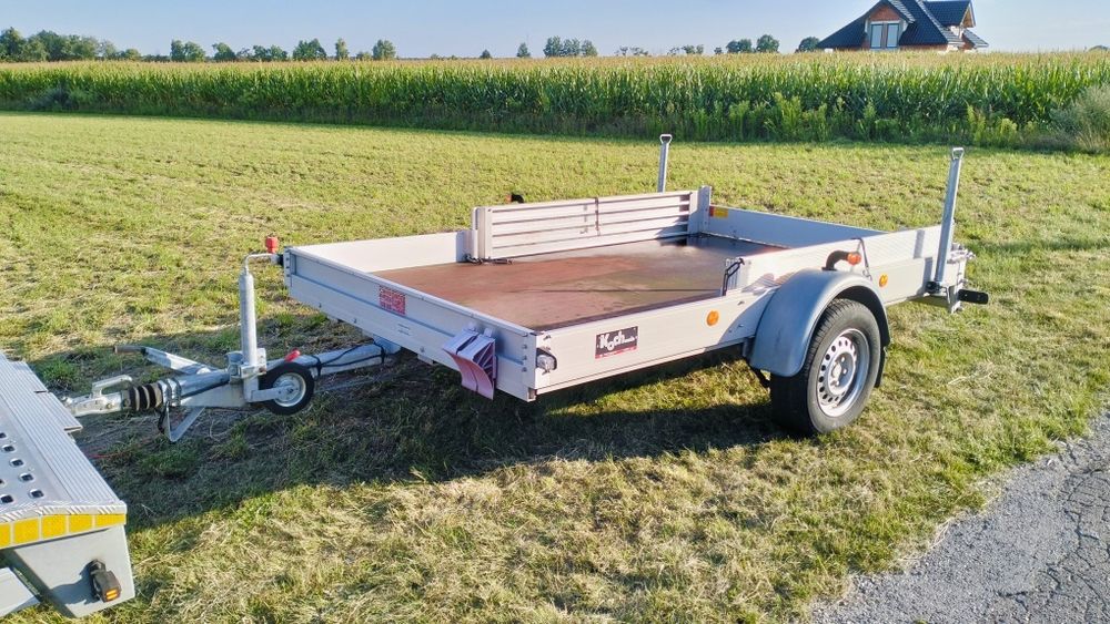 przyczepa przyczepka aluminiowa firmy KOCH 1300kg DMC szeroka platforma kamping