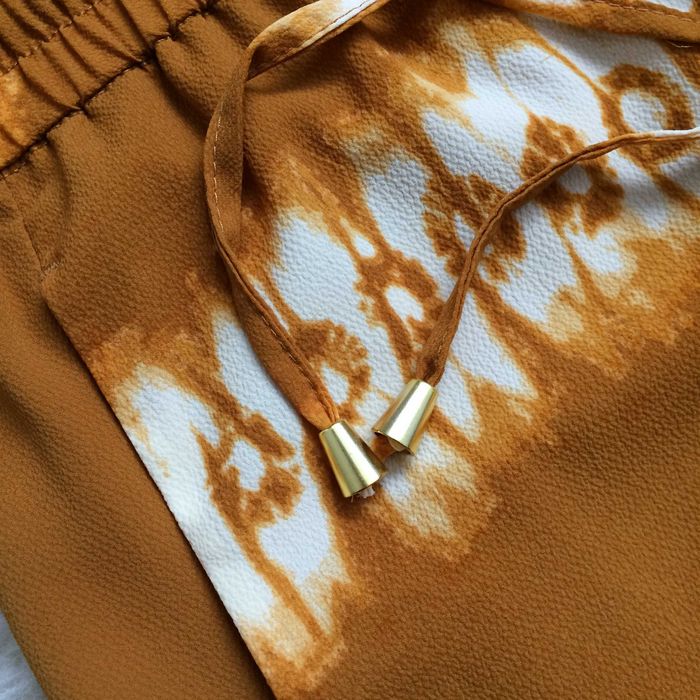 H&M spodnie palazzo musztardowe miodowe tie dye letnie boho L 40