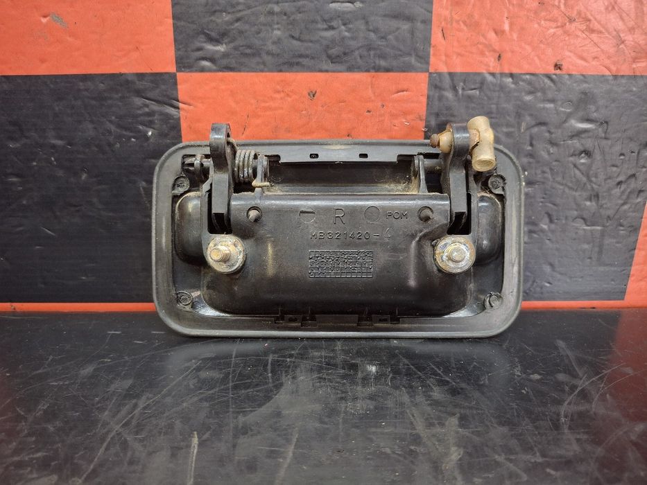 Puxador porta frente direita MITSUBISHI L 200 Pick Up (K0_T, K1_T, K2_