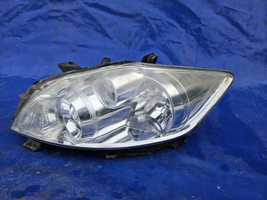 Toyota AURIS I lift 09-11 lampa lewa przednia przód