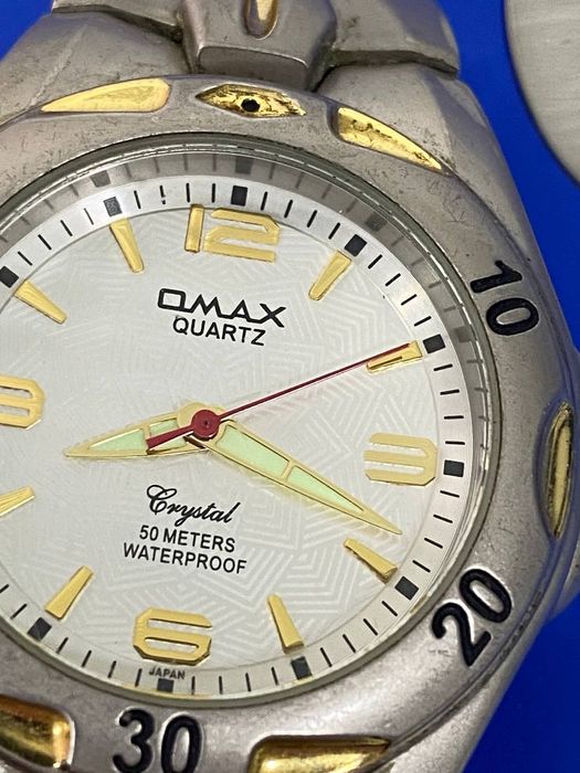 Часы Omax Quartz Crystal "50 m" Japan