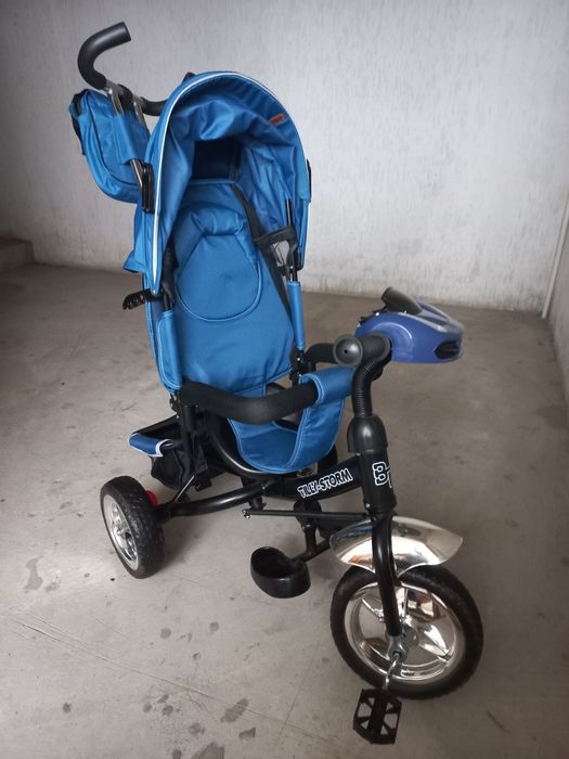 Трёхколёсный велосипед-коляска с родительской ручкой Tilly Storm.