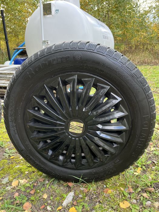 Felgi stalowe +opony zimowe Barum Polaris3+kołpaki seat