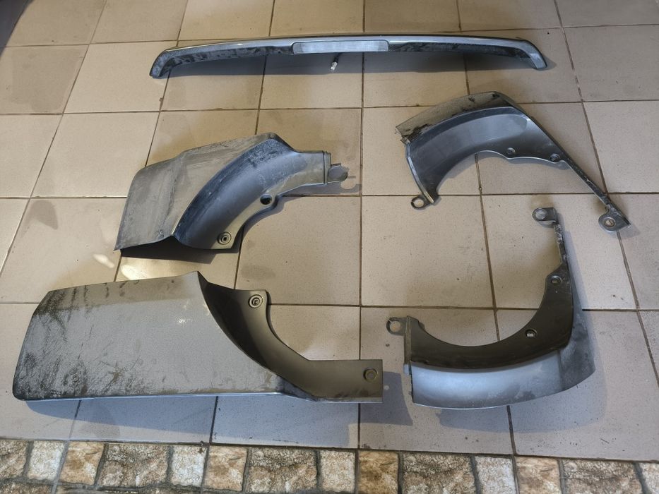 Обшивка пластмасова. Карта дверна. Замок.Задня ляда. Toyota RAV 4. 3 покоління.