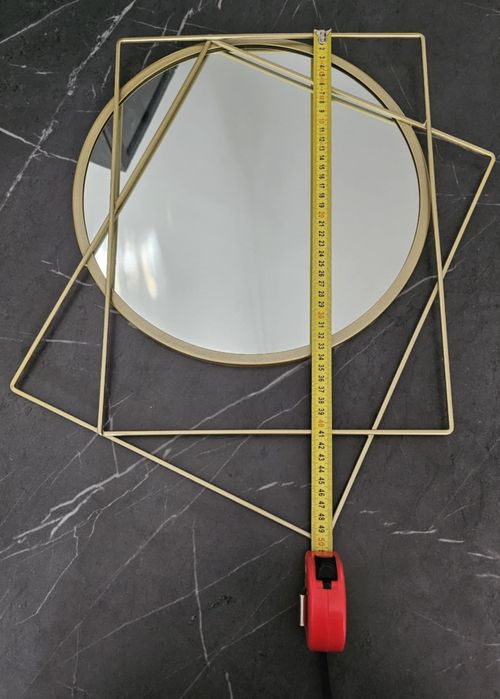 Designerskie lustro naścienne