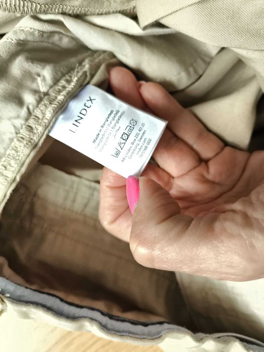 Kremowe eleganckie spodnie chłopięce Lindex, rozmiar 164
