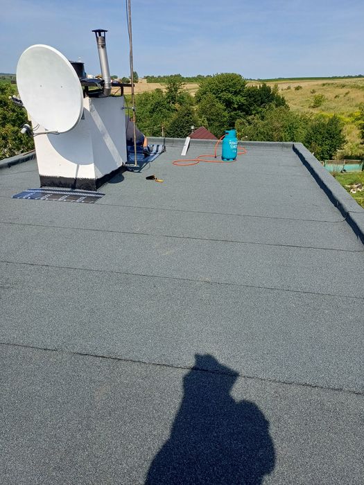 Покрівля дахів євро рубероїдом