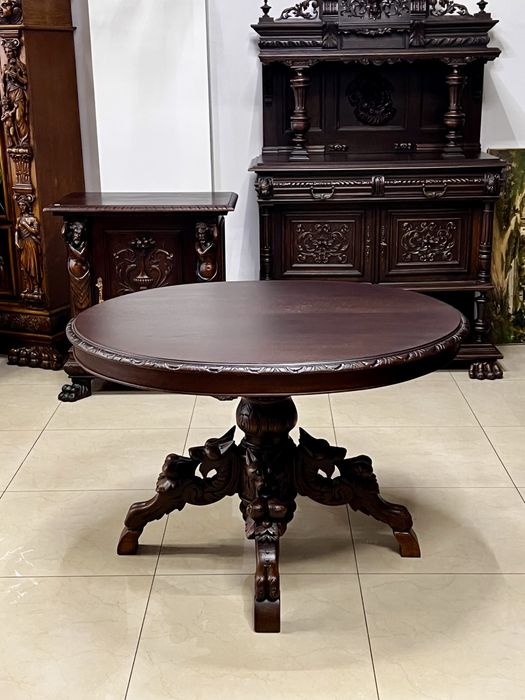 Антикварний овальнийдубовий обідній стіл на 4-х ніжз грифонами.Франція