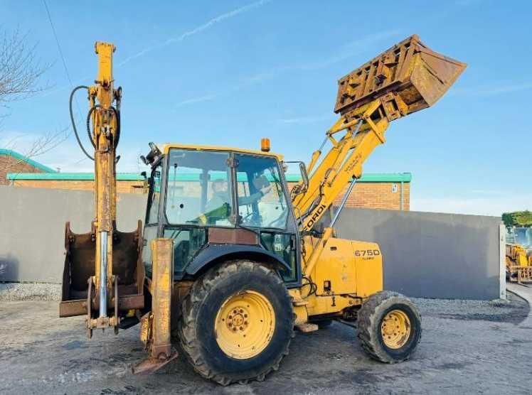 Екскаватор - навантажувач NEW HOLLAND (JCB 3CX)