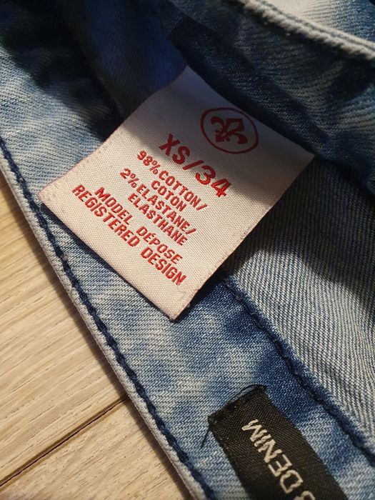 Jasne jeansy,dżinsy z przetarciami