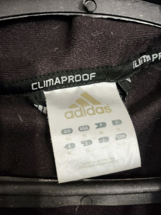 Продам фирменный  пуховик Adidas