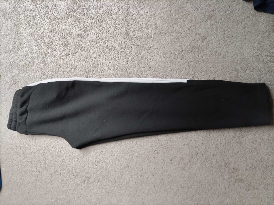Damskie spodnie dresowe joggery sportowe 4F r. XS