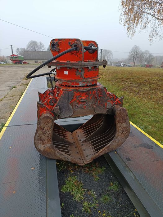 Obrotowy chwytak wyburzeniowo- sortujący