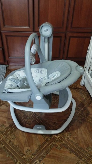 Гойдалка. Закалисувальний центр joie від народження до 9кг.