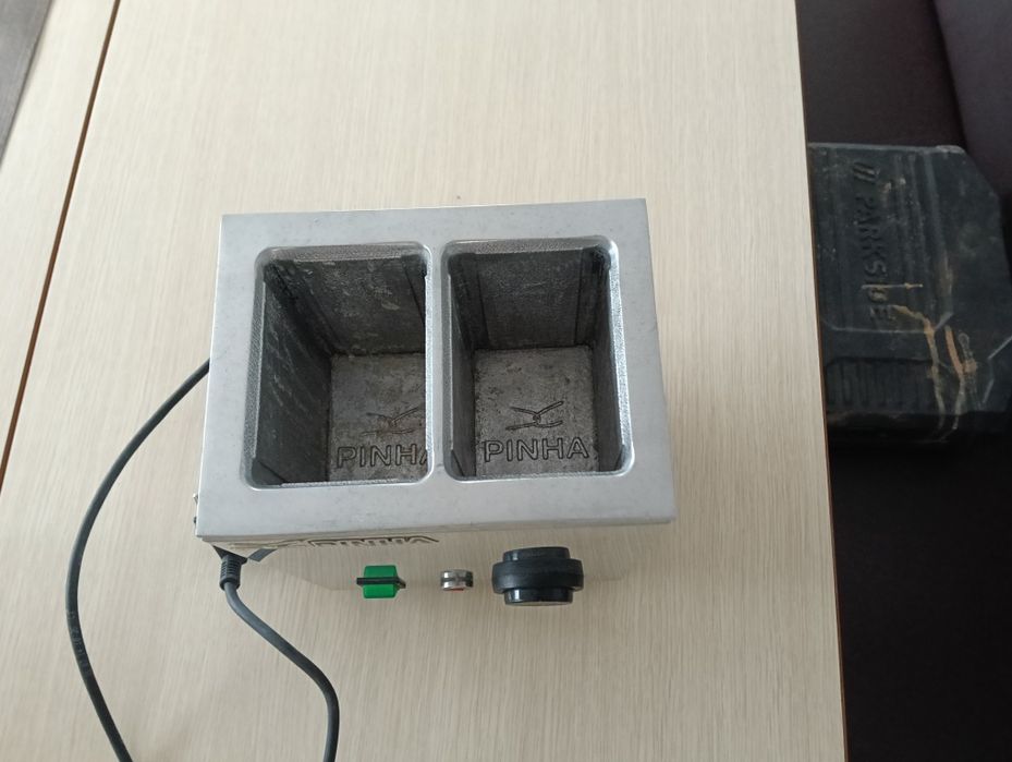 Aquecedor de pacotes de leite