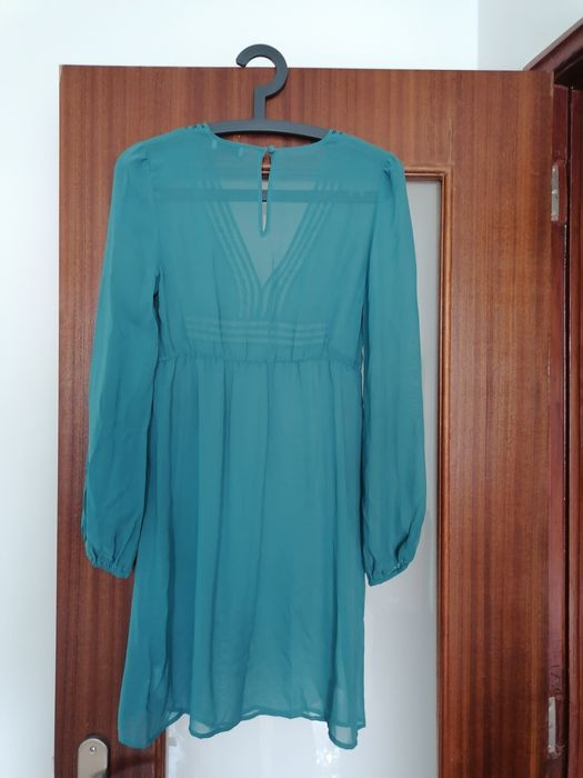 Blusa de cor verde