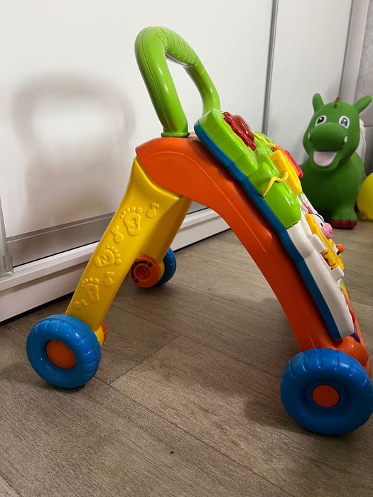Толокар.Это ходунки-каталка VTech Sit-to-Stand Learning Walker с интерактивной игровой панелью