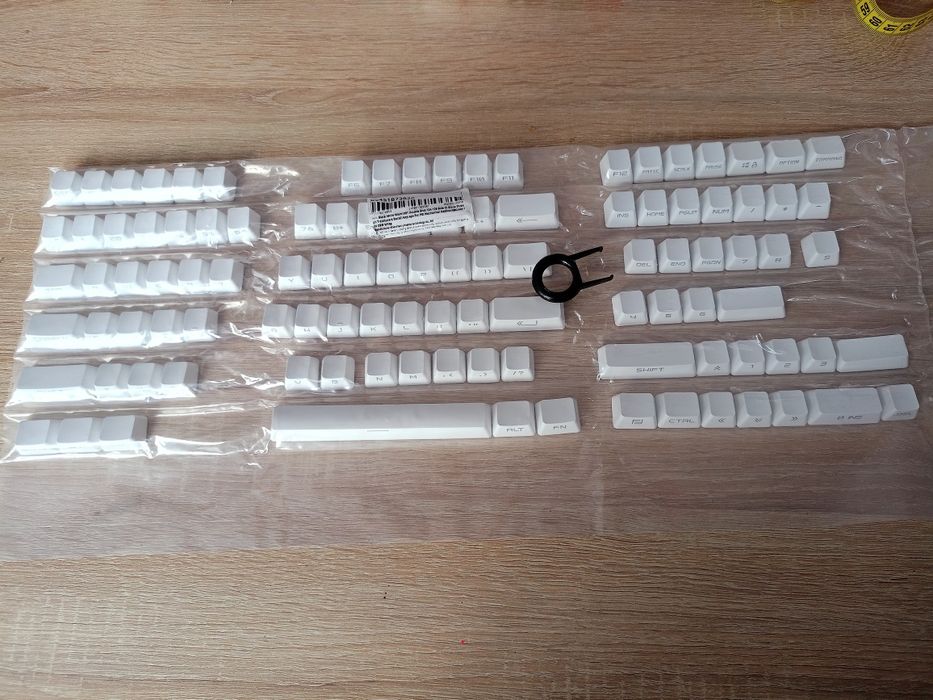 Zestaw białych nakładek na klawisze